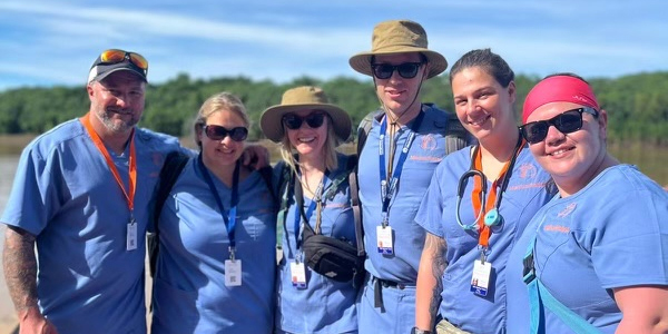 Pine Point Medical team volunteering in Peru rainforest, providing infectious disease consultations and medical care in remote communities
