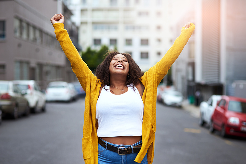 Happy woman celebrating weight loss success with Semaglutide Ozempic injections and Botox treatments at Pine Point Medical